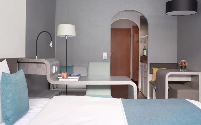 Отель Living Hotel Nürnberg by Derag Германия, Нюрнберг - 2 отзыва об отеле, цены и фото номеров - забронировать отель Living Hotel Nürnberg by Derag онлайн комната для гостей
