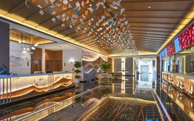 Vienna International Hotel (Qujing Luliang Tongle Plaza)
