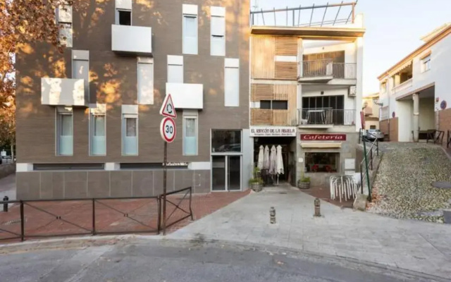 Carmela Suites