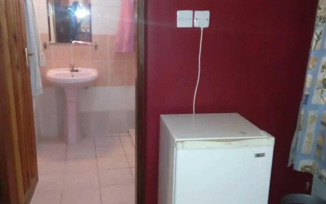 Global African Apartments & Hotel