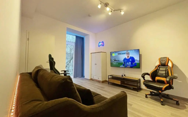 PS5+55 Zoll 4K Fernseher - Gaming Apartment
