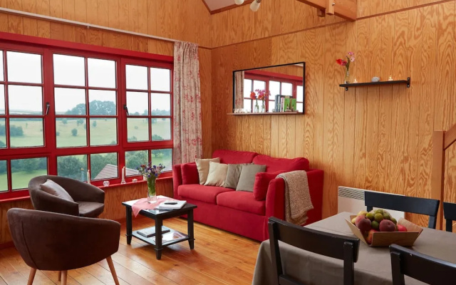 Authentic wooden holiday home in peaceful green surroundings