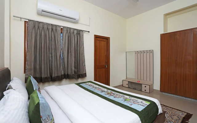 Urvi Apartments by OYO Rooms