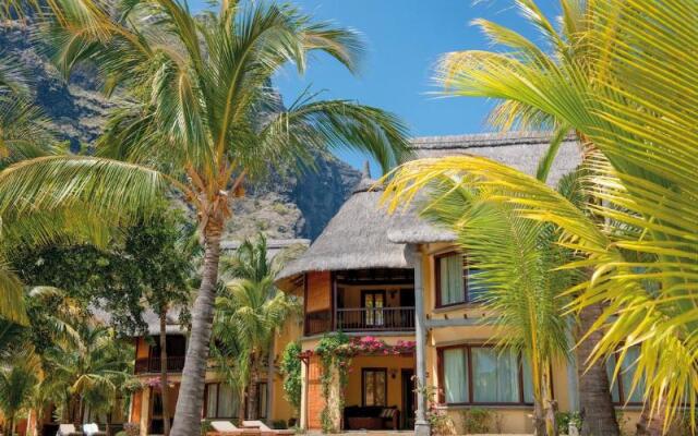 Отель Dinarobin Beachcomber Golf Resort & Spa вид на фасад