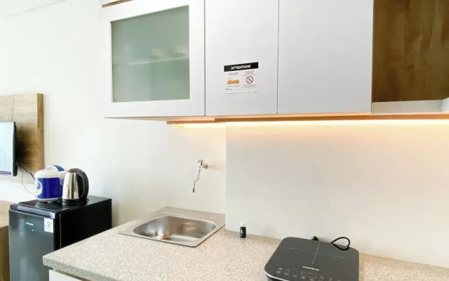Wooden Touch Studio At Lrt City Bekasi Apartment