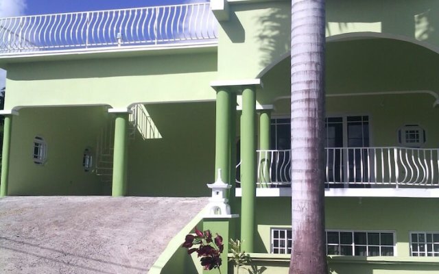 Отель Las Fuentes Sanctuary Ямайка, Боскобел - отзывы, цены и фото номеров - забронировать отель Las Fuentes Sanctuary онлайн вид на фасад