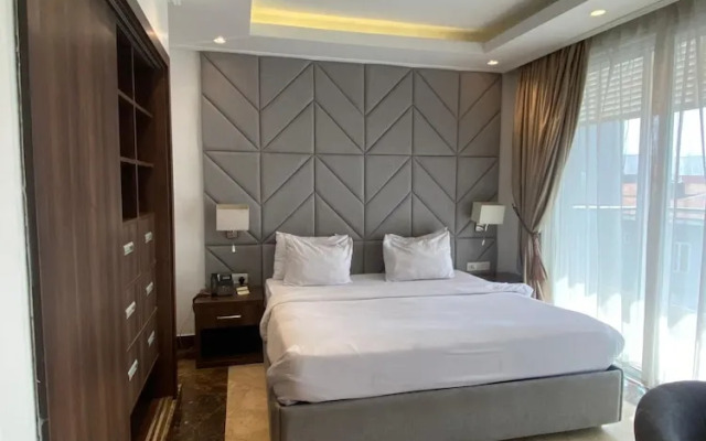 Boardroom Apartment  by Jotani Living