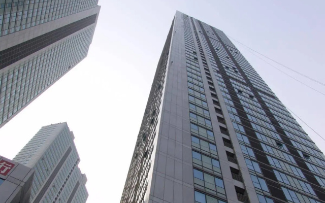 Dalian Jiuxing Apartment
