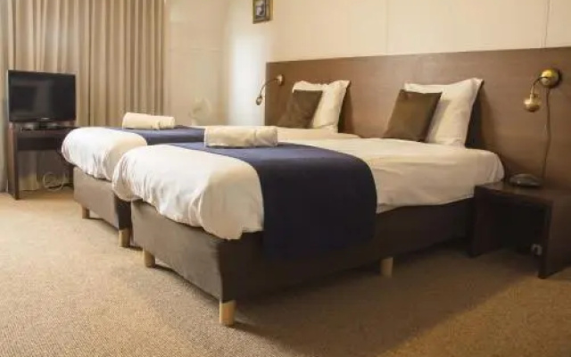 Hotel T Vertrek