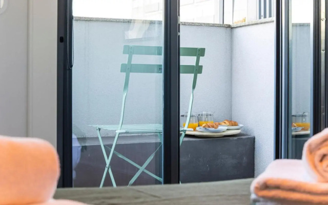 Stylish Studio w/ AC & Balcony by LovelyStay