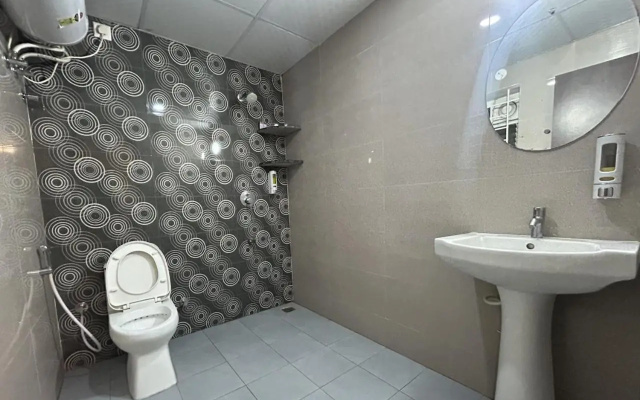 FabHotel Om Residency