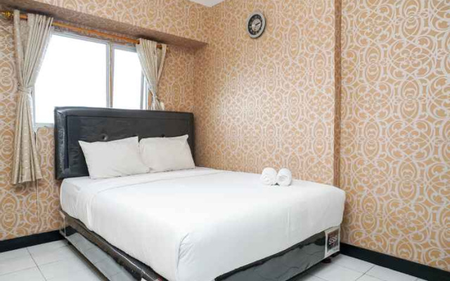 Amazing 1BR at The Wave Rasuna Epicentrum By Travelio