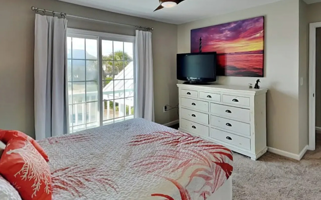 Blue Me A Wave by Topsail Realty
