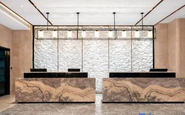 Shiyan Meisheng Holiday Hotel (Shanghai Road University Town)
