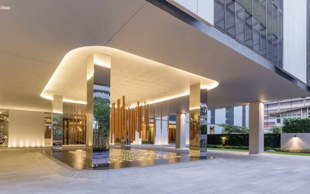 Отель Cozy One Bedroom Condo In Nana Asoke Бангкок вид на фасад