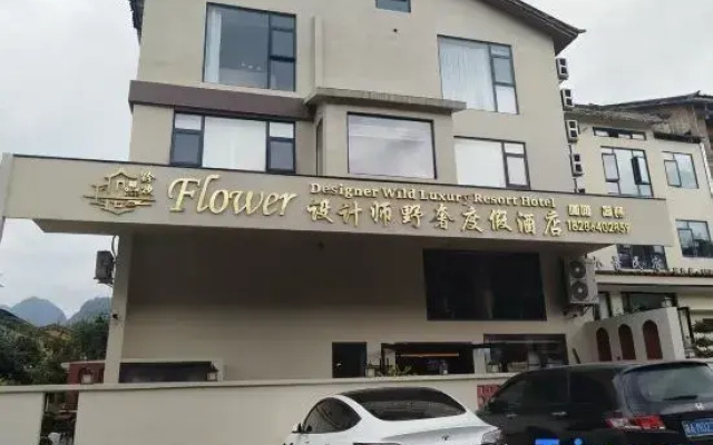 qianhuanflowershejishiyeshedujiajiudian