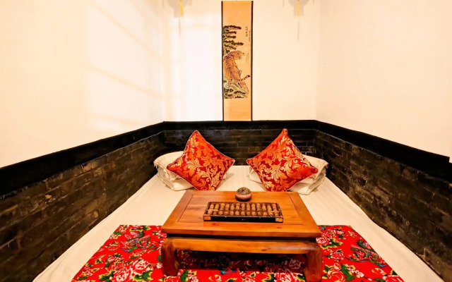Отель Pingyao Yixingtong Inn