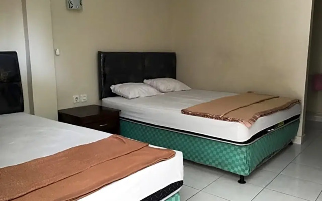 OYO 90520 Kuta Family Guest House