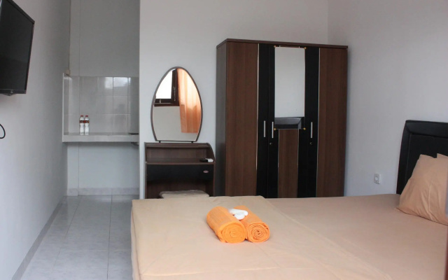 Nida Rooms Gelogor Carik Denpasar at Guest House Orchid