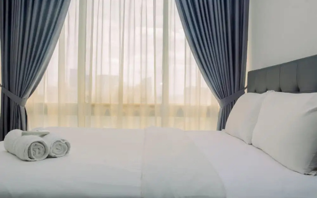 Comfy and Spacious 2BR The Masterpiece Epicentrum Apartment By Travelio