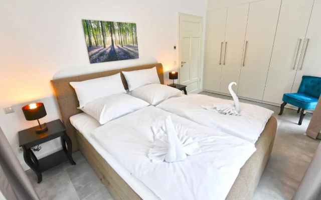 Villa "Levante" F659 Gartenwohnung mit Kamin, Sauna, Terrasse