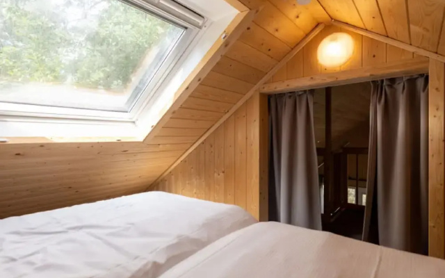 Forest Lodge in Nature With Pond Views