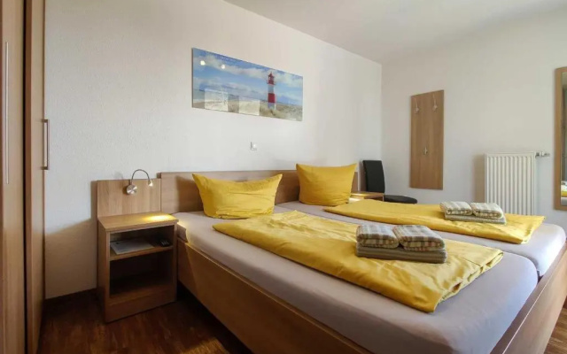 Ferienwohnung-308-Hohe-Lith-Duhnen-mit-eigenem-Strandkorb-am-Strand