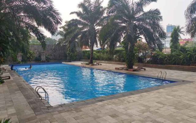 New Furnished 2BR at Mutiara Bekasi Apartment By Travelio