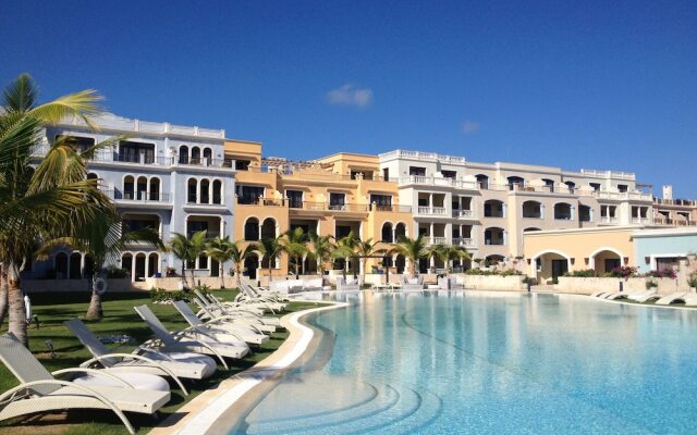 Отель Ancora Punta Cana, All Suites Destination Resort Доминикана, Пунта Кана - 1 отзыв об отеле, цены и фото номеров - забронировать отель Ancora Punta Cana, All Suites Destination Resort онлайн вид на фасад