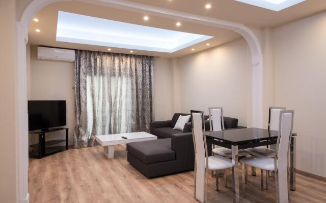 Апартаменты Luxury Living Apartments комната для гостей