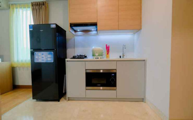 Studio Monas View Apartment at Capitol Suites By Travelio
