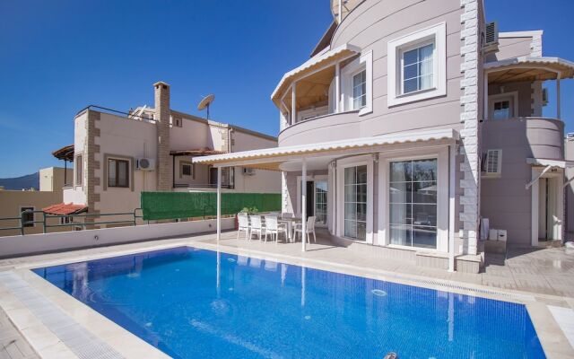 Villa Esya 1 by Akdenizvillam Турция, Калкан - отзывы, цены и фото номеров - забронировать отель Villa Esya 1 by Akdenizvillam онлайн вид на фасад