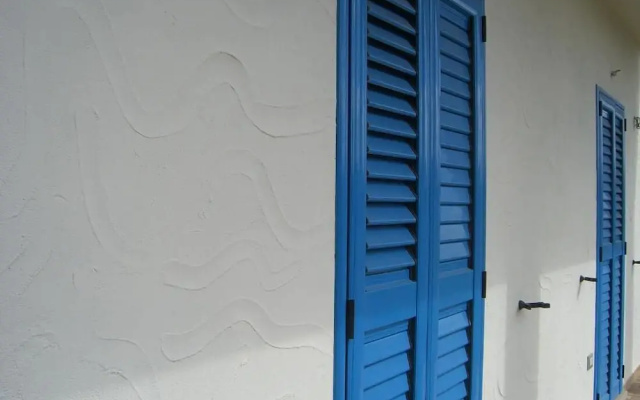 Room in Guest Room - S'olivariu Village Affittacamere - King Room With Roll-in Shower