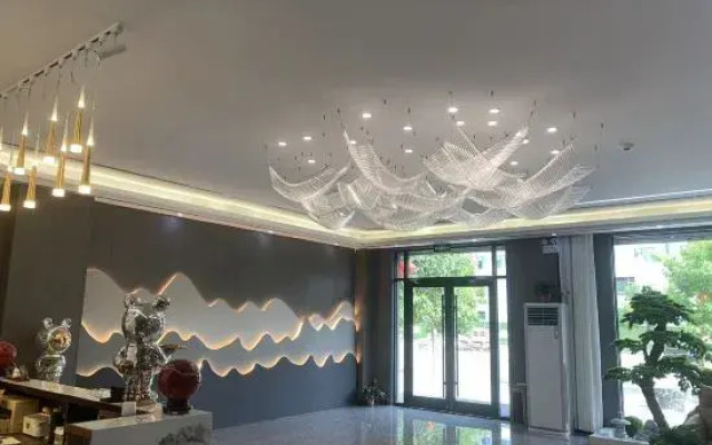 Xinle Shengjin Hotel