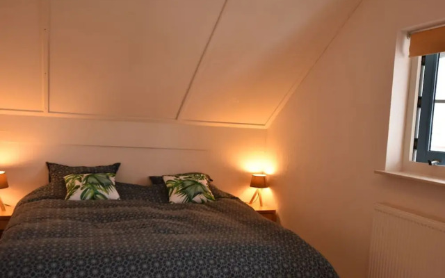 Exclusive Holiday Home Floating on a Lake in Friesland