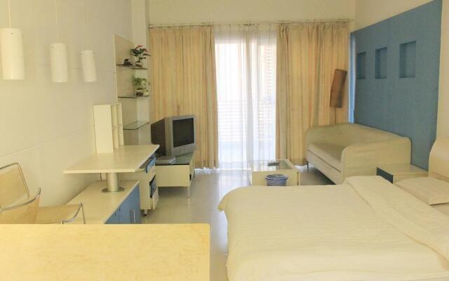 Апартаменты Xinhai Holiday Apartment комната для гостей