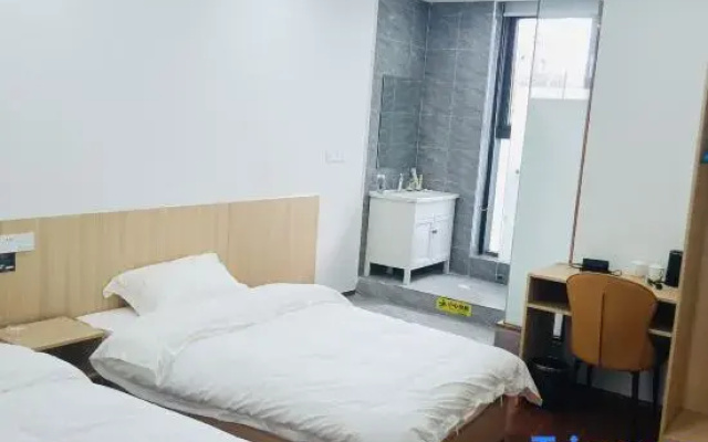 Tianxin Hotel (Ningbo Yinzhou Hebang Building)