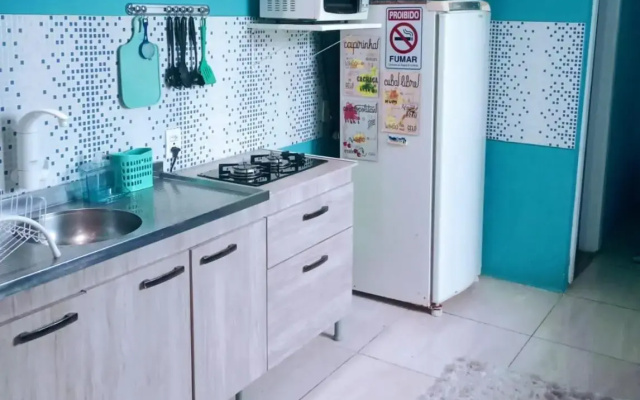 Stúdio inteiro em casa familiar-ar cond próx praia