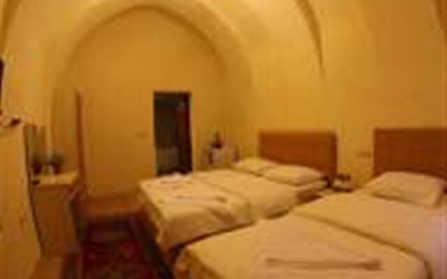 Falcon Cave Suites Турция, Гёреме - 1 отзыв об отеле, цены и фото номеров - забронировать отель Falcon Cave Suites онлайн комната для гостей