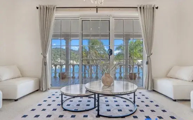 Stunning 4BR Holiday Home with Water Views & Pool