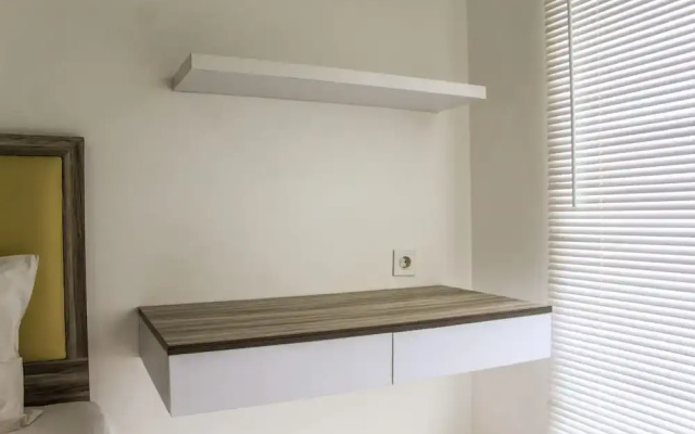 Relaxing 2BR Apartment at M-Town Residence By Travelio