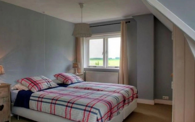 Spacious Farmhouse in IJzendijke with Garden