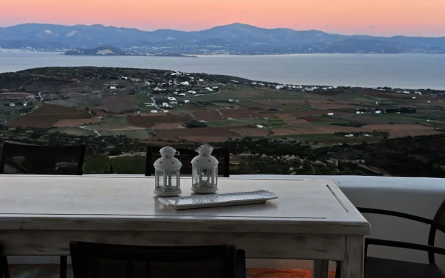 Panoramic three villa complex with helipad by VillaRentalsgr