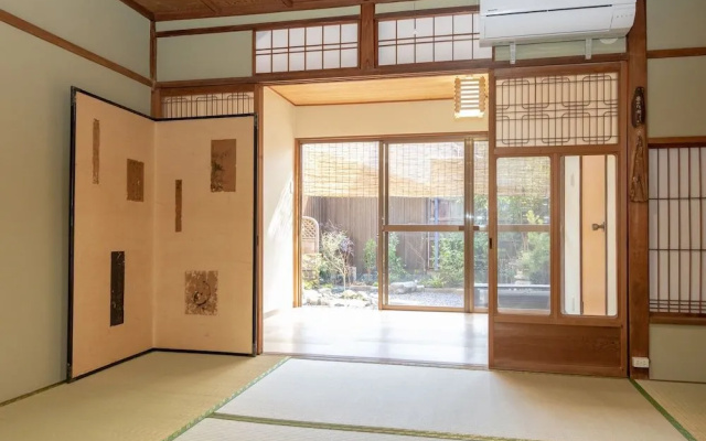 Jyuraku Tomi