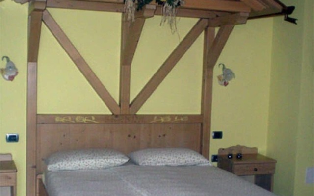Отель Agriturismo Maso Alle Rose Горнолыжный курорт Скирама Доломити Адамелло Брента комната для гостей