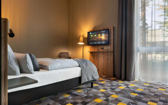 Отель Holiday Inn - the niu, Timber Esslingen, an IHG Hotel