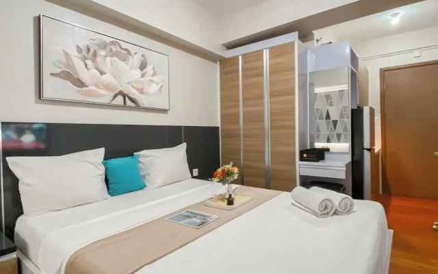 Warm and Homey Studio at Podomoro Golf View Apartment
