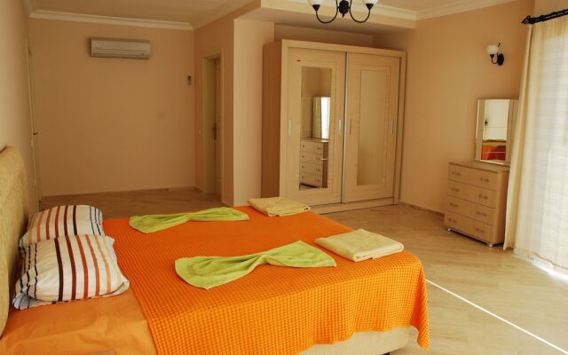 Cetinkaya Apartments Турция, Калкан - отзывы, цены и фото номеров - забронировать отель Cetinkaya Apartments онлайн комната для гостей