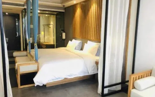 Moshe Hotel (Zhengzhou East Railway Station Mixc Store)