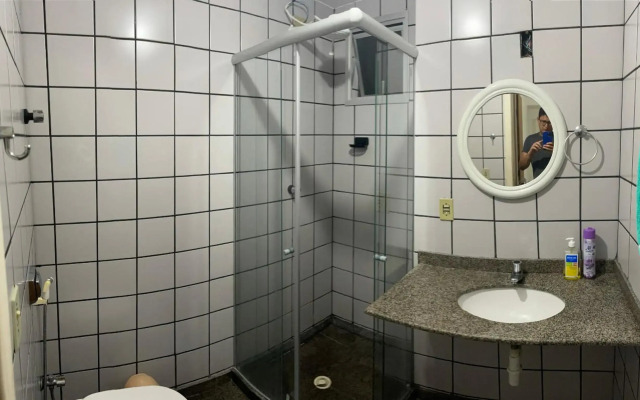 Apartamento Guarapari pé na areia com Wi-Fi e Garagem